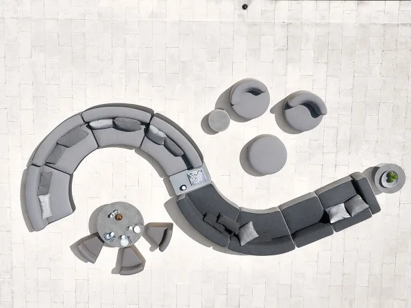 A curved composition of the Modular Sofa by Varaschin
