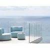 Belt gepolsterter couchtisch by Varaschin auf einer terrasse