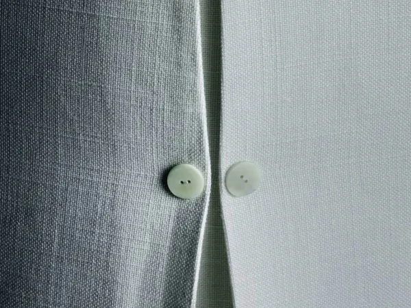 Details of buttons on the back of the Ariel armchair