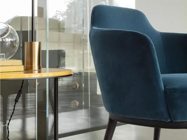 Details of the backrest and armrest of the Lucylle armchair by Lema