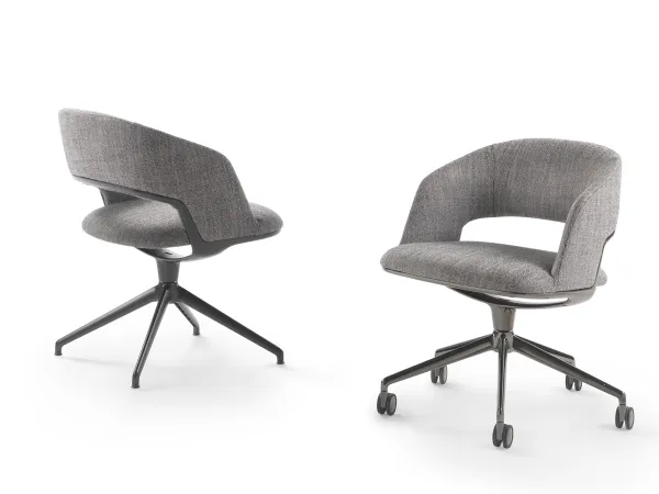Fixed version and version with automatic return swivel mechanism of the Alma armchair