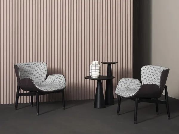 Pairing two Jove side tables by Baxter in a living room