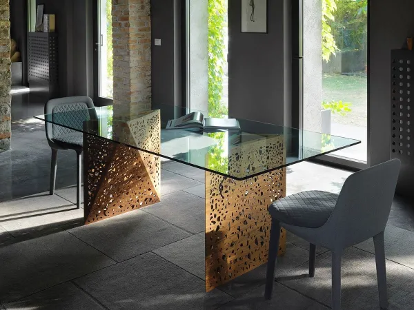 The Riddled table in a setting