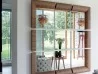 Porada Triple mirror in a living area