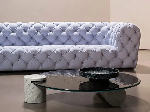 The Verre Particulier coffee table with the Chester Moon sofa by Baxter