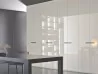 Details of the doors and handles of the Elegant wardrobe by Lema