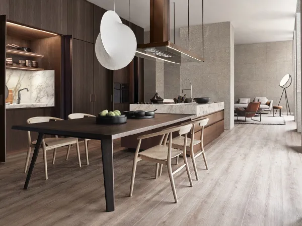 La cocina Convivium con mesa integrada de Arclinea