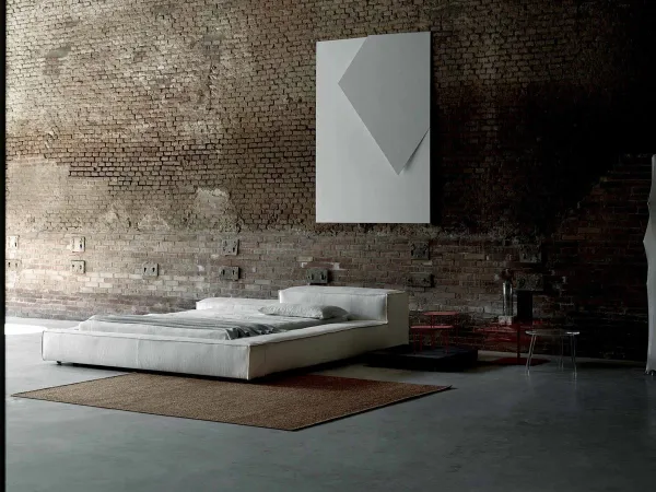 Il letto Extrasoft di Living Divani in un ambiente