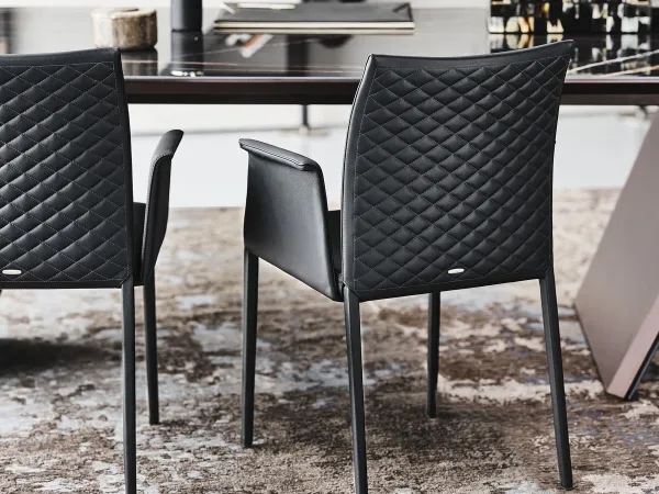The Norma Couture chair in the version with armrests