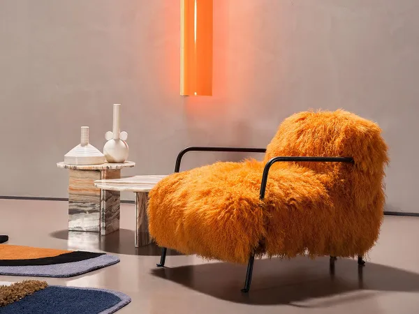La mesa de centro Tebe de Baxter con el sillón Bruxelles