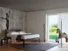 Moheli Bett in einem Schlafbereich