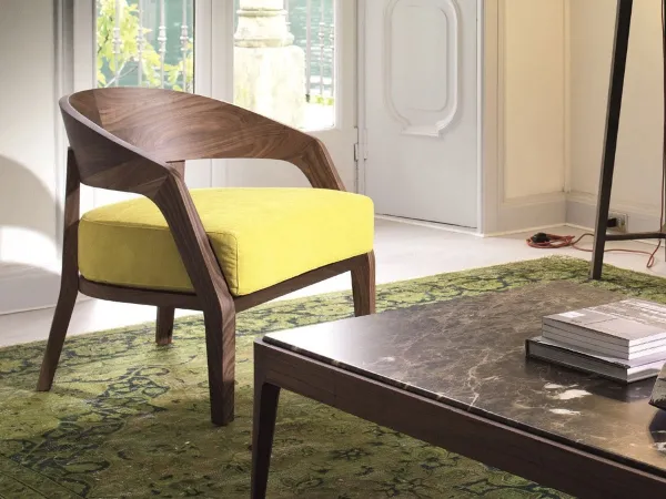 The Alba armchair by Porada in a living room