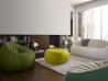 The Ottoman Loveseat sofa by Ligne Roset combined with the ottoman from the same line