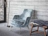The Guscio armchair by Flexform in a living area