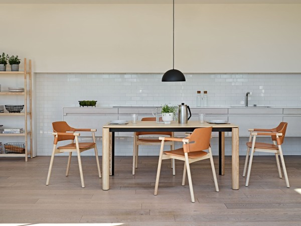 The Woody table by Midj in a dining room