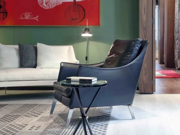 Blue version of the Boss armchair by Flexform