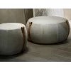 Notch pouf by Lema in fabric with leather straps